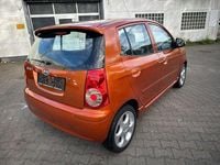 Second-hand Kia Picanto 65 CP (47 kW) 2009 Portocaliu Hatchback