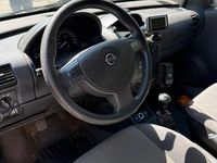 Second-hand Opel Combo 97 CP (71 kW) 2006 Argintiu Monovolum