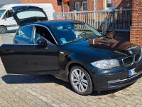 Gebraucht BMW 118 143 PS (105 kW) 2010 Schwarz Kleinwagen