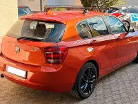 Gebraucht BMW 114 95 PS (69 kW) 2013 Orange Kleinwagen