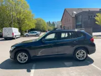 Second-hand BMW X1 143 CP (105 kW) 2014 Negru SUV