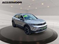 Gebraucht Opel Mokka Ultimate 131 PS (96 kW) 2023 Kontrast grau/quarz silber SUV