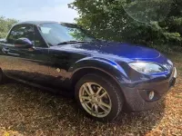 Gebraucht Mazda MX5 126 PS (92 kW) 2010 Tiamatblau metallic Cabrio