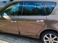 Gebraucht Renault Scénic 107 PS (78 kW) 2010 Braun Van / Kleinbus