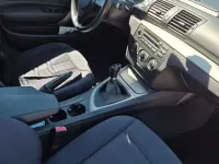 Second-hand BMW 116 122 CP (89 kW) 2009 Negru Hatchback