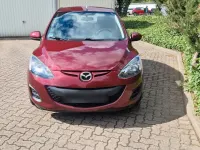 Gebraucht Mazda 2 75 PS (55 kW) 2012 Rot Kleinwagen