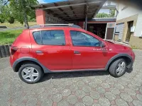 Gebraucht Dacia Sandero Celebration 90 PS (66 kW) 2013 Rot Limousine
