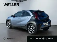 Gebraucht Toyota Aygo Team 72 PS (52 kW) 2025 Celestite grey / black mica (grau) Kleinwagen