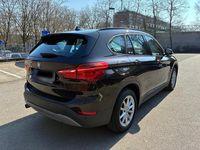 Używany BMW X1 Advantage 150 KM (110 kW) 2016 Brązowy SUV