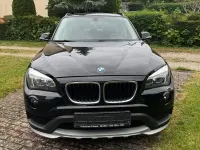 Używany BMW X1 116 KM (85 kW) 2014 Czarny SUV