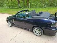 Używany Opel Astra Cabriolet 115 KM (84 kW) 1994 Purpurowy Kabriolet
