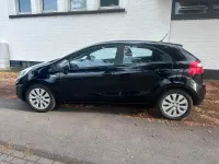 Gebraucht Kia Rio Edition 7 80 PS (58 kW) 2013 Schwarz Kleinwagen