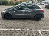 Gebraucht Peugeot 207 Forever 92 PS (67 kW) 2012 Grau Kleinwagen