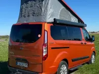 Occasion Ford Transit Custom Nugget 131 ch (96 kW) 2023 Orange