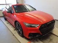 Gebraucht Audi S7 Sportback Ambiente 344 PS (253 kW) 2023 Tangorot metallic Kleinwagen