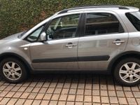 Usado Suzuki SX4 107 HP (78 kW) 2007 Cinzento Sedan