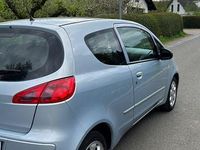 Second-hand Mitsubishi Colt Invite 95 CP (69 kW) 2006 Albastru Berlinǎ