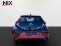 Gebraucht Toyota Aygo X Basis 72 PS (52 kW) 2024 Chili red perleffekt/ night sky black SUV