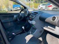 Gebraucht Peugeot 107 68 PS (50 kW) 2010 Schwarz Kleinwagen