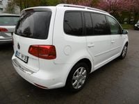 Second-hand VW Touran Cup 105 CP (77 kW) 2014 Alb Monovolum
