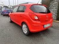 Gebraucht Opel Corsa Color Edition 101 PS (74 kW) 2010 Rot Kleinwagen