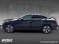 Gebraucht Mercedes GLC300e Advanced 313 PS (230 kW) 2024 Metalliclack obsidianschwarz Coupé