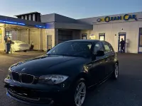 Gebraucht BMW 116 122 PS (89 kW) 2010 Schwarz Kleinwagen