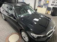 Gebraucht BMW 320e 190 PS (139 kW) 2021 Schwarz Kombi