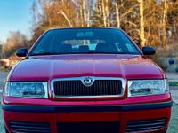 Używany Skoda Octavia 110 KM (80 kW) 2004 Czerwony Sedan/Limuzyna