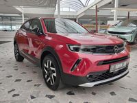 Gebraucht Opel Mokka-e Elegance 100 kW (136 PS) 2022 Power rot/kosmos rot SUV