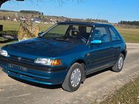 Gebraucht Mazda 323 88 PS (64 kW) 1993 Grün Kleinwagen