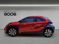 Gebraucht Toyota Aygo X Pulse 72 PS (52 kW) 2023 Chili red (3u4)/ black mica (2 SUV