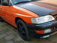 Gebraucht Ford Escort Cabriolet 131 PS (96 kW) 1991 Orange Cabrio
