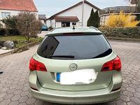 Gebraucht Opel Astra 110 PS (80 kW) 2011 Grün Kombi