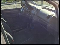 Second-hand VW Caddy 102 CP (75 kW) 2011 Gri Monovolum