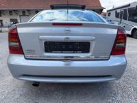 Second-hand Opel Astra 147 CP (108 kW) 2000 Argintiu Coupe