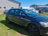 Second-hand Kia Ceed 135 CP (99 kW) 2013 Negru Hatchback
