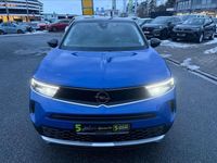 Gebraucht Opel Mokka-e Elegance 100 kW (136 PS) 2023 Lackierung voltaic blue met/ty SUV