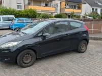 Gebraucht Ford Fiesta 60 PS (44 kW) 2010 Schwarz Limousine