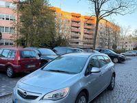 Second-hand Opel Astra 140 CP (102 kW) 2012 Gri Break