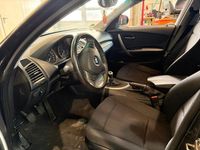 Gebraucht BMW 116 122 PS (89 kW) 2010 Schwarz Kleinwagen