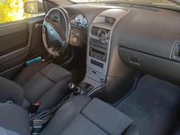 Second-hand Opel Astra 147 CP (108 kW) 2002 Argintiu Coupe