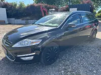 Gebraucht Ford Mondeo Titanium 163 PS (119 kW) 2014 Pantherschwarz metallic Kombi