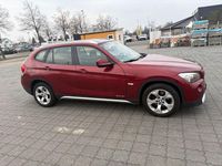 Second-hand BMW X1 xLine 143 CP (105 kW) 2009 Roșu SUV