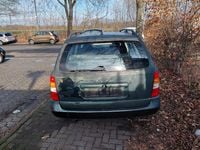 Gebraucht Opel Astra 75 PS (55 kW) 1999 Grün Kombi