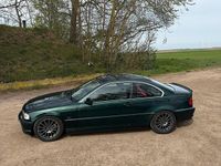 Second-hand BMW 323 Basis 170 CP (125 kW) 2000 Verde Coupe