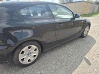 Second-hand BMW 116 122 CP (89 kW) 2008 Negru Hatchback