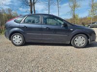 Second-hand Ford Focus Style 101 CP (74 kW) 2007 Albastru Berlinǎ