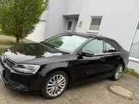 Używany VW Jetta 105 KM (77 kW) 2012 Czarny Sedan/Limuzyna