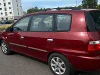Gebraucht Kia Carens 140 PS (102 kW) 2004 Rot Van / Kleinbus